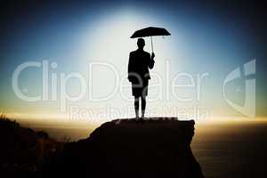 Composite image of black woman with umbrella