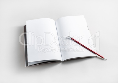 Brochure and pencil