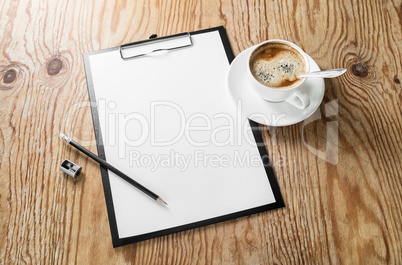 Clipboard with a blank paper