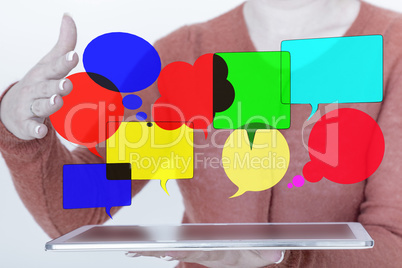 Woman with tablet pc and speech bubbles