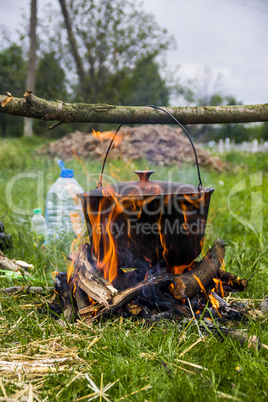 cauldron on campfire