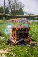 cauldron on campfire