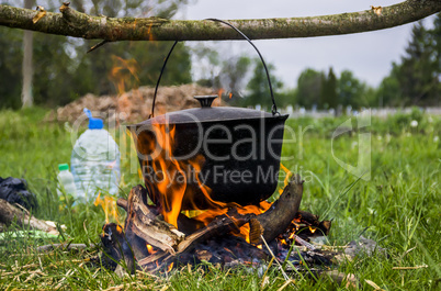 cauldron on campfire