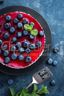 Delicious blueberry cake with fresh berries and marmalade, tasty cheesecake