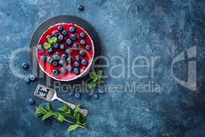 Delicious blueberry cake with fresh berries and marmalade, tasty cheesecake