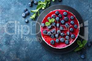 Delicious blueberry cake with fresh berries and marmalade, tasty cheesecake