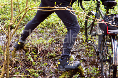 Bicycle, veloplasty, walk, forest, spring, male, to cross the river, river, log, bog