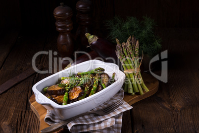 Baked eggplant with green asparagus
