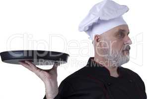 Bearded chef with tray in hands