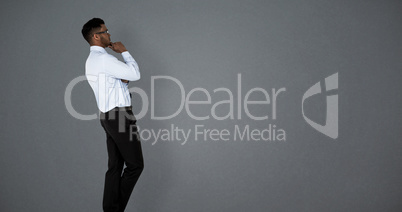 Composite image of thoughtful businessman standing against white background Composite image of thoughtful businessman standing against white background