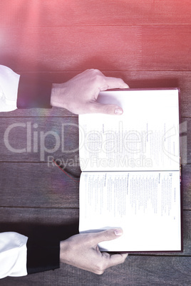 Cropped woman holding bible