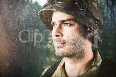 Composite image of close up of thoughtful military soldier