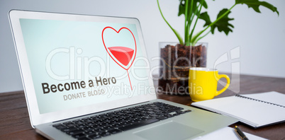 Composite image of become a hero text with heart shape on screen