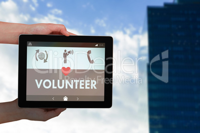 Composite image of close-up of hands holding digital tablet