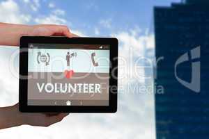 Composite image of close-up of hands holding digital tablet