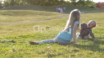 Lovely children enjoying time playing in park