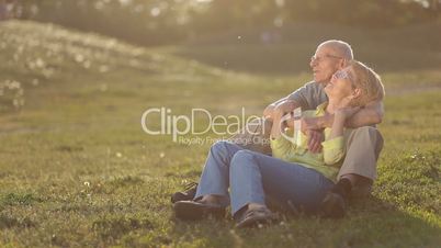 Senior couple in love enjoying togetherness outdoor