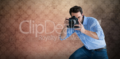 Composite image of full length of photographer photographing through digital camera