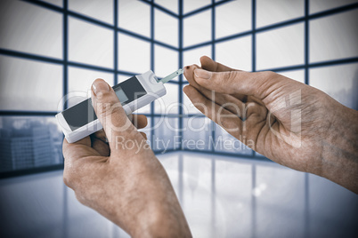 Composite image of close up of woman hands testing blood sugar with glucometer