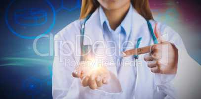 Composite image of mid section of female doctor showing empty hand