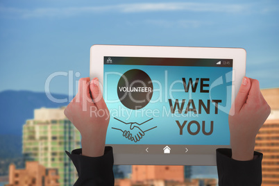 Composite image of feminine hands holding tablet