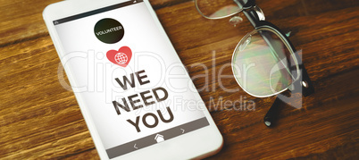 Composite image of vector image of we need you text with icons