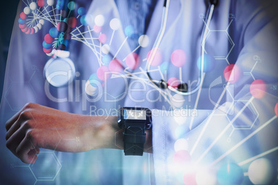 Composite image of mid section of female doctor showing smart watch