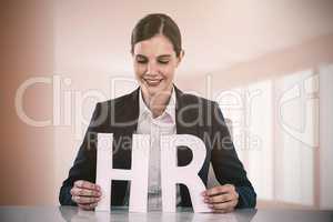 Composite image of woman looking letters h and r