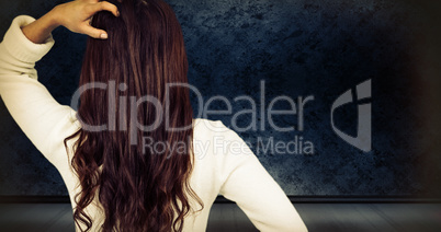 Composite image of rear view of confused woman with hand in hair