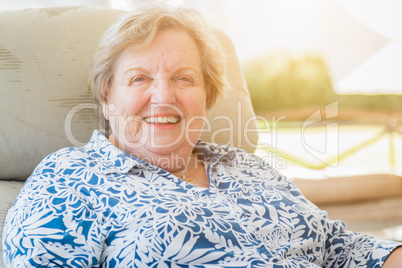 Pretty Senior Woman Portrait on Patio.