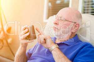 Senior Adult Man Using Smart Cell Phone.