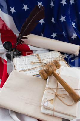 Gavel and legal documents arranged on American flag