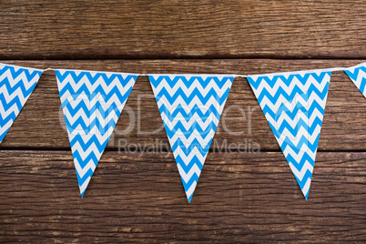 Bunting arranged on wooden table