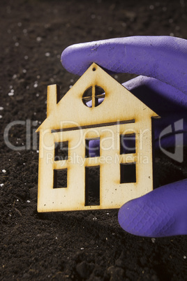 Model of house in hand