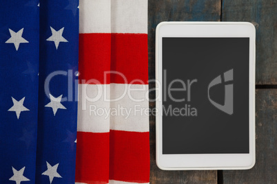 Digital tablet on American flag