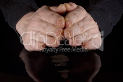 Female hands and their reflection