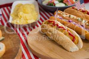 Hot dogs on wooden table with 4th july theme