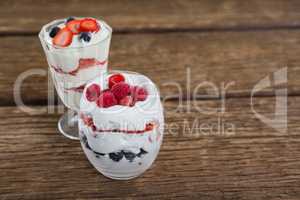 Fruit ice cream on wooden table