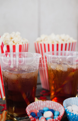 Popcorn, confectionery and drink with 4th july theme