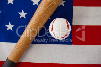 Baseball bat and ball on American flag
