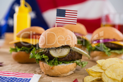 Close-up of burger decorated with 4th july theme