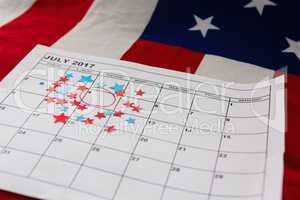 Calendar marked with star shape decoration