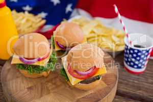Burgers on wooden table with 4th july theme
