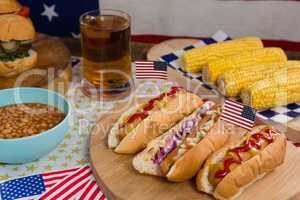 Hot dogs on wooden table with 4th july theme