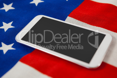 Digital tablet on American flag