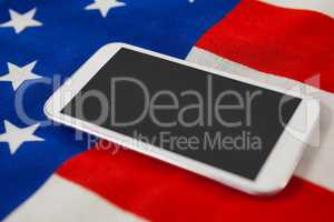 Digital tablet on American flag