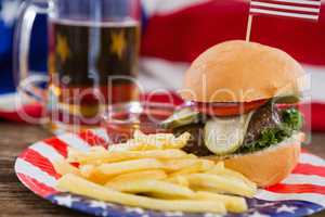 Burger on wooden table with 4th july theme