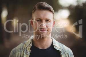 Portrait of handsome young man at olive farm