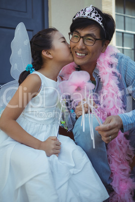 Father and daughter in fairy costume