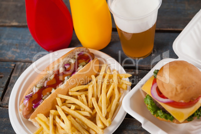 Drink and snacks on wooden table